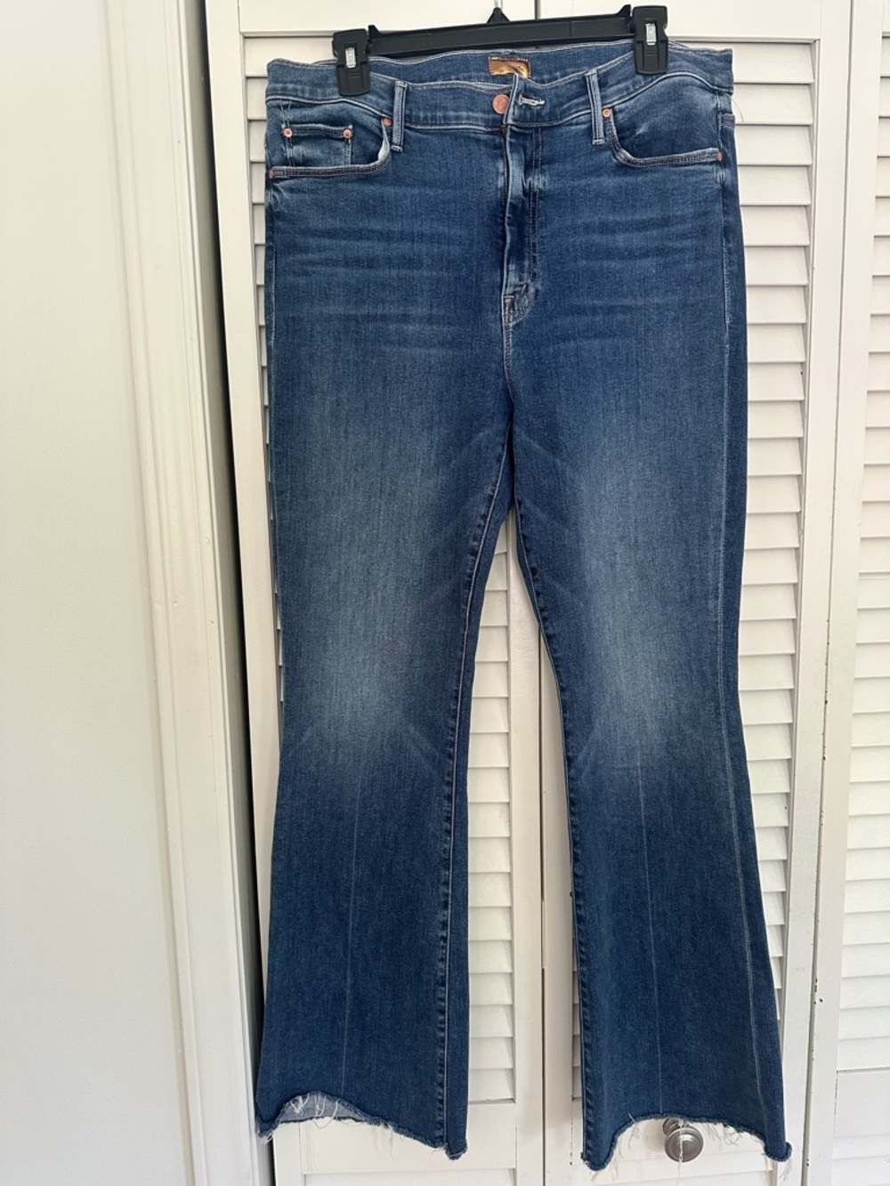 MOTHER Medium Blue Flare Jeans with Raw Hem